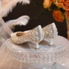 cn-11134207-7ras8-m37ak6gct9hmdb.webp Rhinestone Pearl Stiletto Wedding Heels