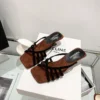 cn-11134207-820l4-mpg9z883xdzfbe.webp Retro Cross-Strap Roman Heels